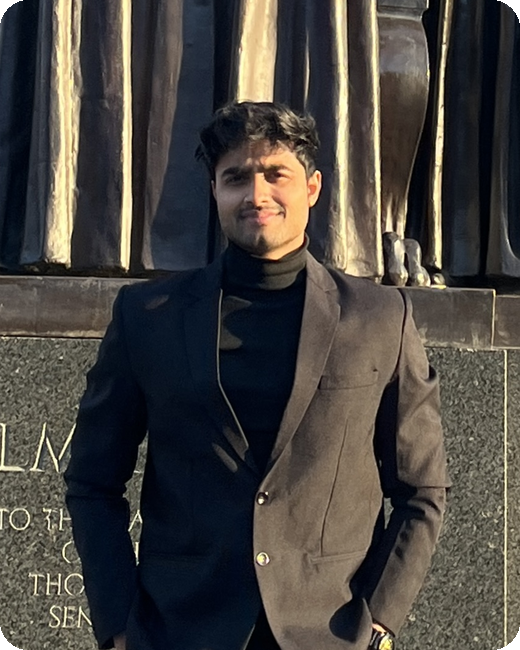 Shreyash Bhatkar at the Alma Mater statue, UIUC